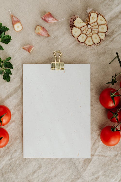 white cupboard with herbs on table